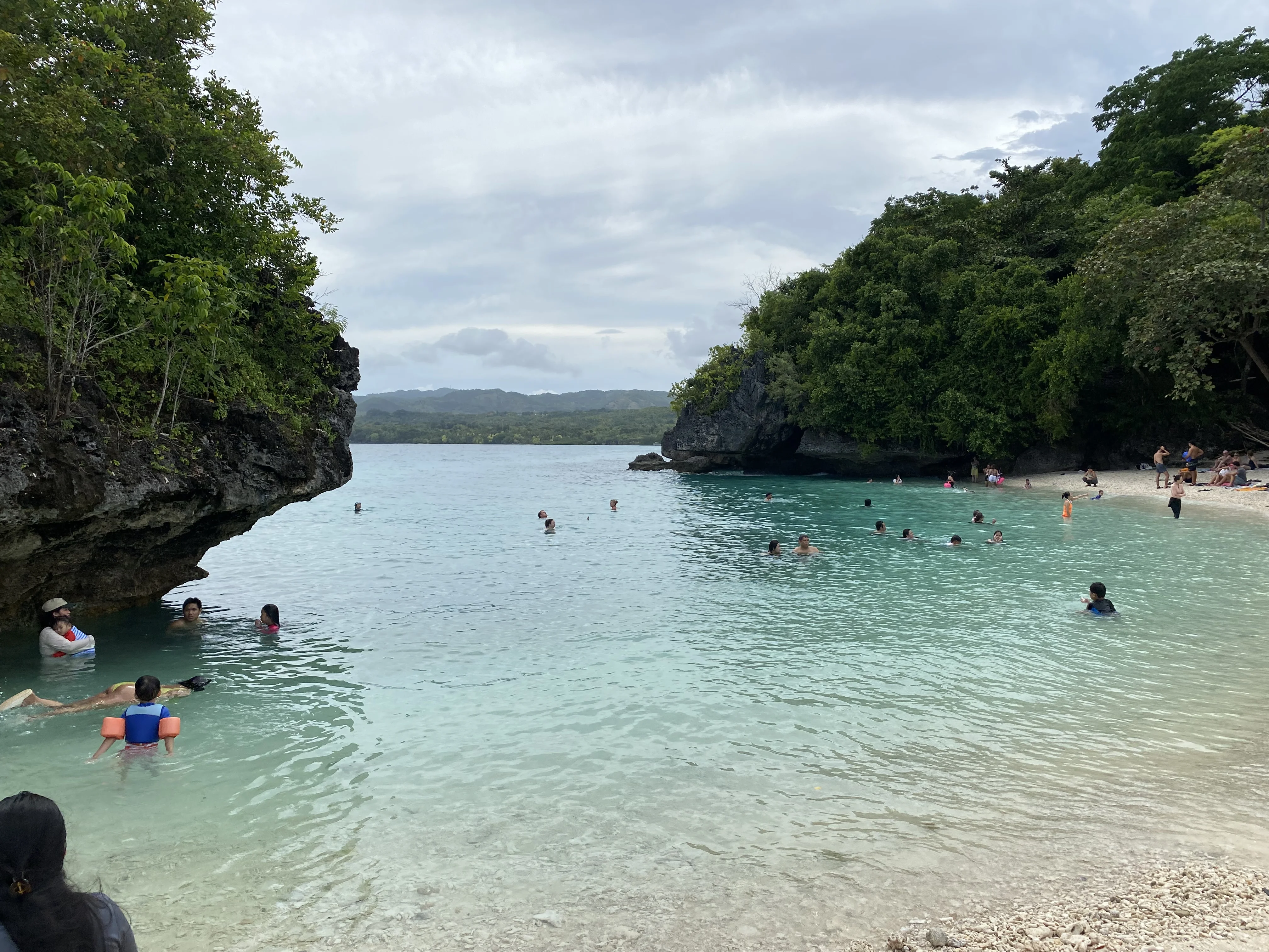 People swimming at Salagdoong Beach in Siquijor